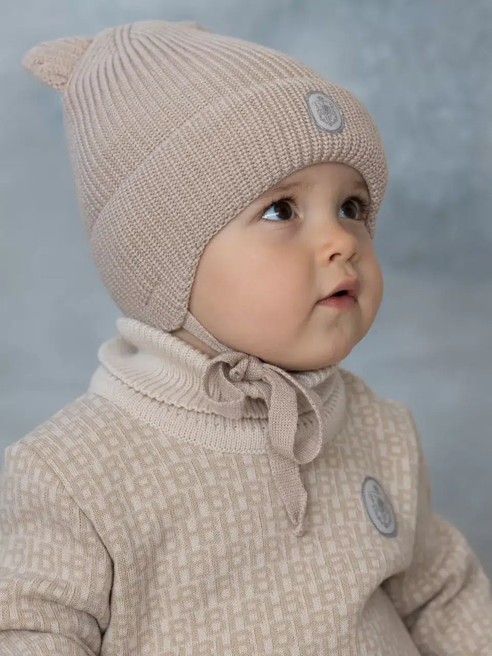 3d67c71e-7021-11ef-abbd-d45d6440942f_d35e0f41-71c7-11ef-abbd-d45d6440942f Шапка зимняя Наследник Выжанова бежевый с ушками 4