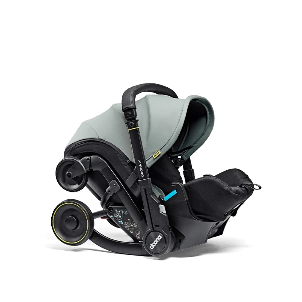 kolyaska-avtokreslo-doona-x-dusty-sage-pylnyy-shalfey-15-1000x1000 Коляска-автокресло Doona X 6