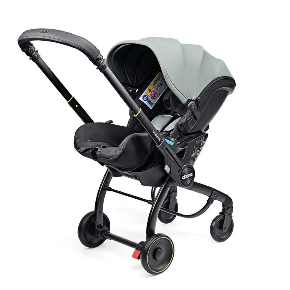 kolyaska-avtokreslo-doona-x-dusty-sage-pylnyy-shalfey-17-1000x1000 Коляска-автокресло Doona X 3