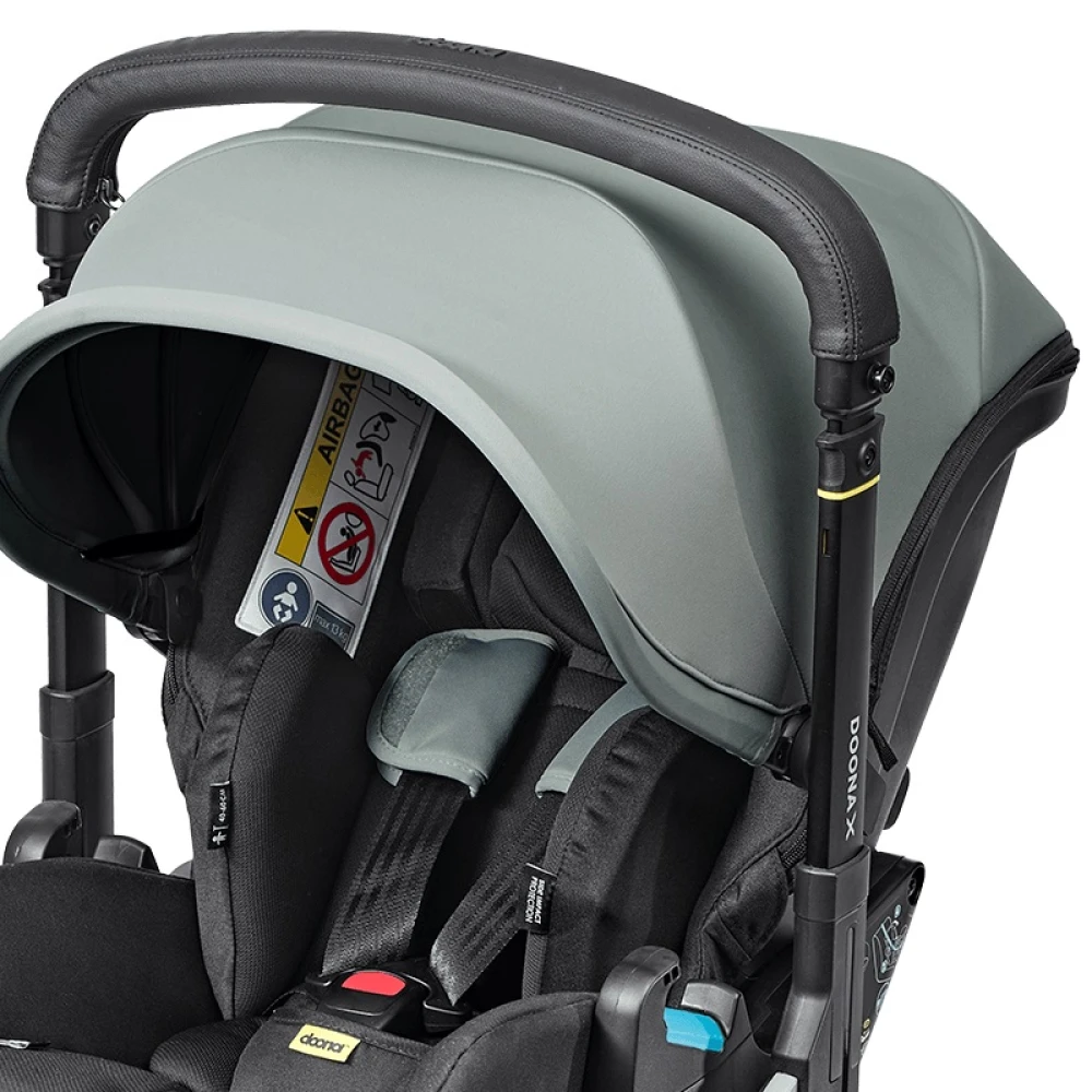 kolyaska-avtokreslo-doona-x-dusty-sage-pylnyy-shalfey-19-1000x1000 Коляска-автокресло Doona X 4